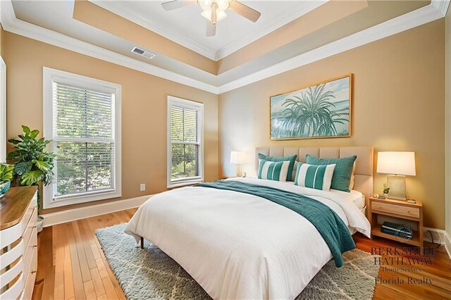 2380 Crescent Park Ct Unit 4, Atlanta, GA 30339 - bedroom with a raised ceiling, ornamental molding, hardwood / wood-style floors, baseboards, and ceiling fan