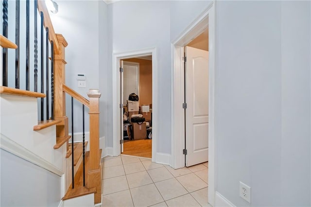 2380 Crescent Park Ct Unit 4, Atlanta, GA 30339 - entrance foyer with light tile patterned flooring, baseboards, and stairs