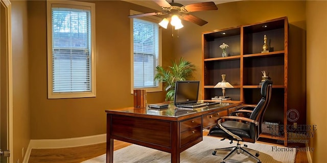 2380 Crescent Park Ct Unit 4, Atlanta, GA 30339 - office area featuring a ceiling fan, baseboards, plenty of natural light, and wood finished floors