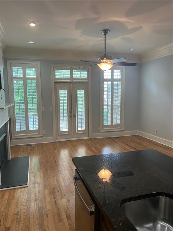 2380 Crescent Park Ct Unit 4, Atlanta, GA 30339 - doorway to outside with crown molding, baseboards, plenty of natural light, a ceiling fan, and recessed lighting