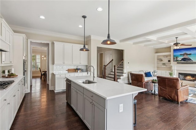 673 Dunbrody Dr, Milton, GA 30004 - kitchen featuring a sink, open floor plan, stainless steel appliances, dark wood-type flooring, and light countertops
