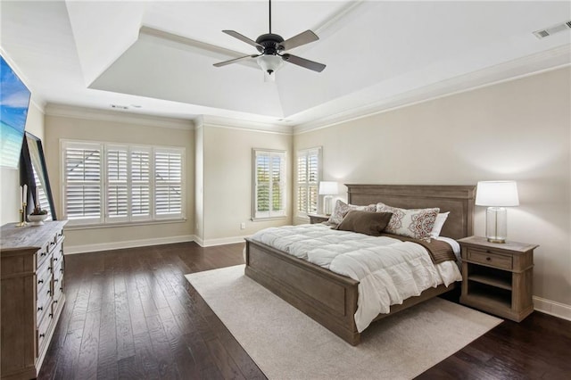 673 Dunbrody Dr, Milton, GA 30004 - bedroom with dark wood-type flooring, a raised ceiling, baseboards, and ornamental molding