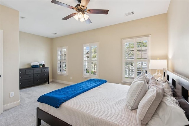 673 Dunbrody Dr, Milton, GA 30004 - bedroom with carpet floors, baseboards, and ceiling fan