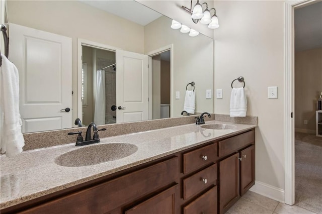 673 Dunbrody Dr, Milton, GA 30004 - bathroom with double vanity, tile patterned flooring, a shower with curtain, and baseboards