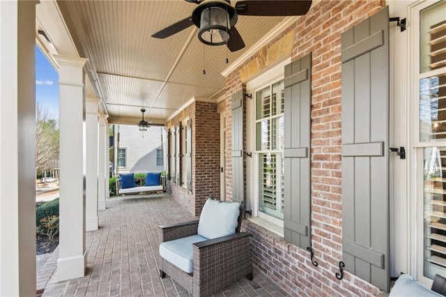 673 Dunbrody Dr, Milton, GA 30004 - covered porch with a ceiling fan