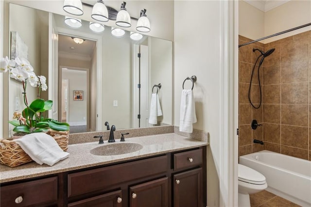 673 Dunbrody Dr, Milton, GA 30004 - full bath featuring crown molding, vanity, bathing tub / shower combination, toilet, and tile patterned floors