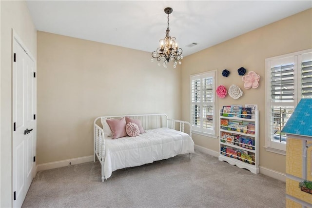 673 Dunbrody Dr, Milton, GA 30004 - carpeted bedroom with a chandelier and baseboards