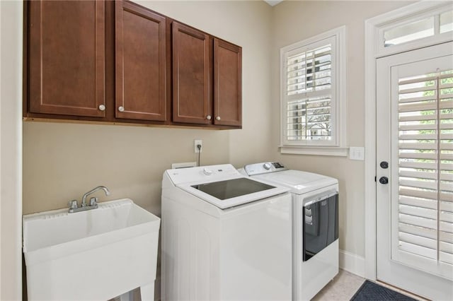 673 Dunbrody Dr, Milton, GA 30004 - laundry room with washer and clothes dryer, cabinet space, and baseboards