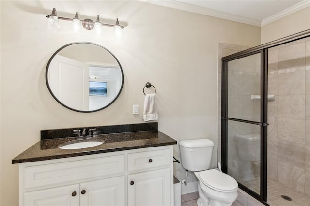 673 Dunbrody Dr, Milton, GA 30004 - full bathroom featuring vanity, toilet, a shower stall, crown molding, and tile patterned flooring