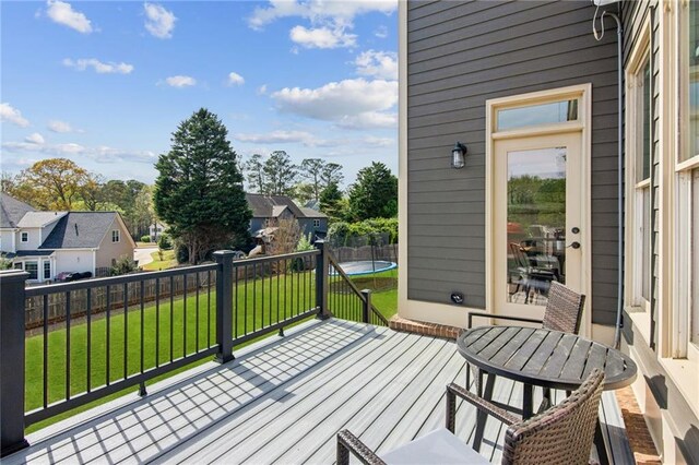 673 Dunbrody Dr, Milton, GA 30004 - wooden deck with a trampoline