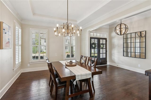 673 Dunbrody Dr, Milton, GA 30004 - dining room featuring a chandelier, dark wood-style floors, crown molding, a raised ceiling, and baseboards