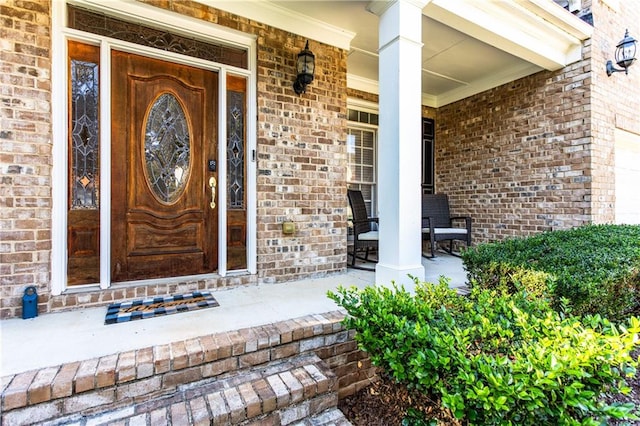 property entrance with a porch