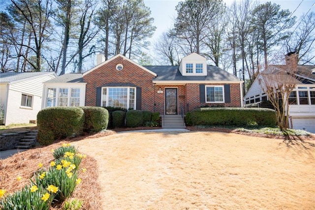 1251 Cumberland Rd NE, Atlanta, GA 30306 - new england style home featuring brick siding