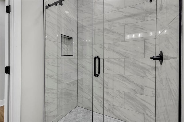 bathroom featuring a shower stall