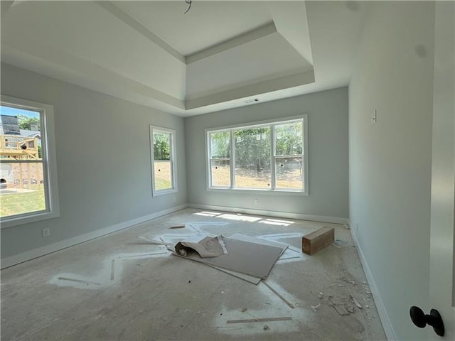 3 Outpost Trl SE, Rome, GA 30161 - unfurnished room featuring a raised ceiling, healthy amount of natural light, and baseboards