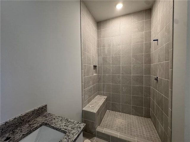3 Outpost Trl SE, Rome, GA 30161 - bathroom featuring a tile shower, vanity, recessed lighting, and tile patterned flooring