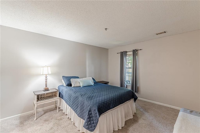 215 Cobblestone Trl, Avondale Estates, GA 30002 - bedroom featuring light carpet, a textured ceiling, and baseboards