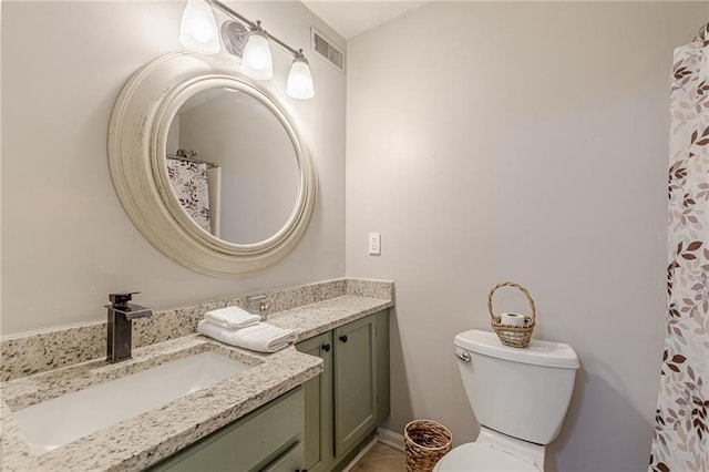 215 Cobblestone Trl, Avondale Estates, GA 30002 - full bath featuring vanity, toilet, and tile patterned flooring