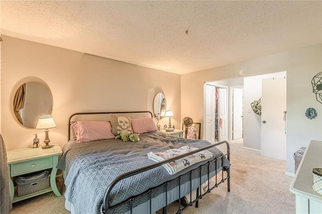 215 Cobblestone Trl, Avondale Estates, GA 30002 - bedroom featuring light colored carpet, a textured ceiling, and baseboards