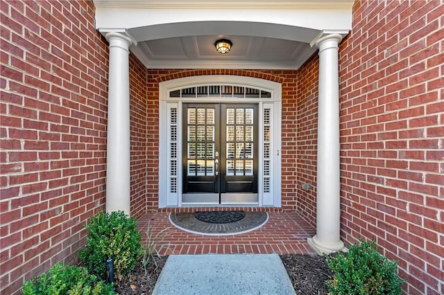 property entrance featuring french doors