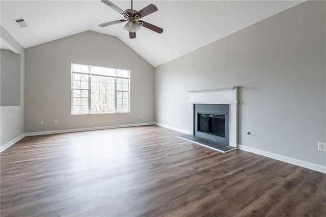 unfurnished living room featuring ceiling fan, dark hardwood / wood-style flooring, and lofted ceiling