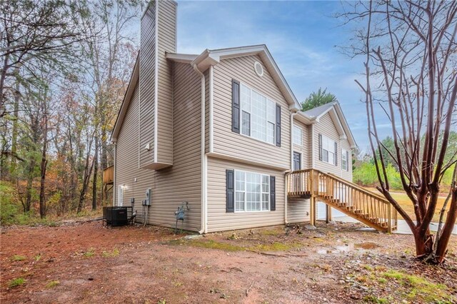 view of property exterior with cooling unit