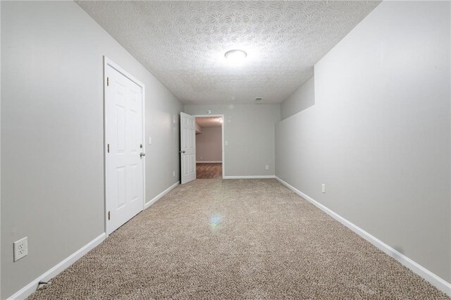 spare room featuring a textured ceiling