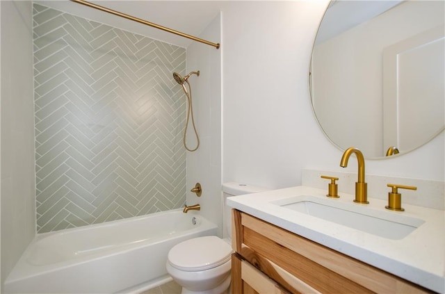 full bathroom with vanity, toilet, and tiled shower / bath