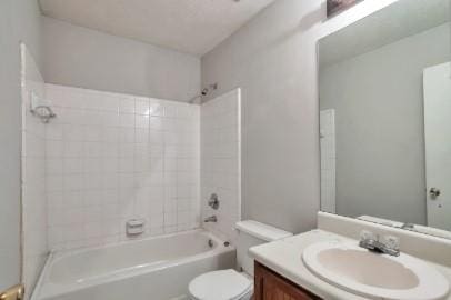 full bathroom with vanity,  shower combination, and toilet