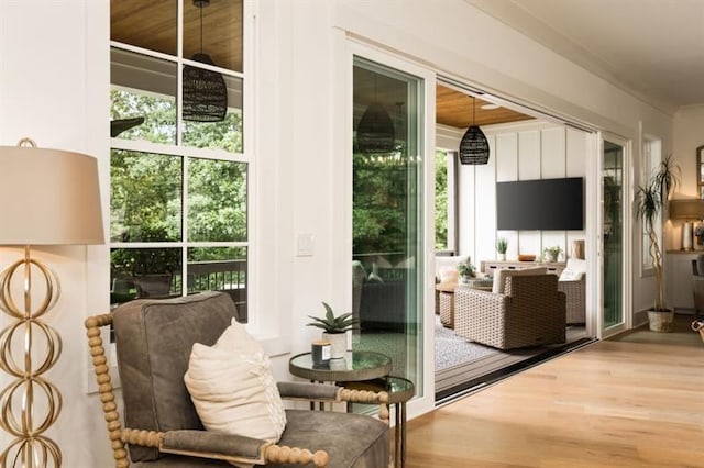 doorway to outside with wood finished floors