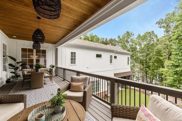 balcony with an outdoor hangout area