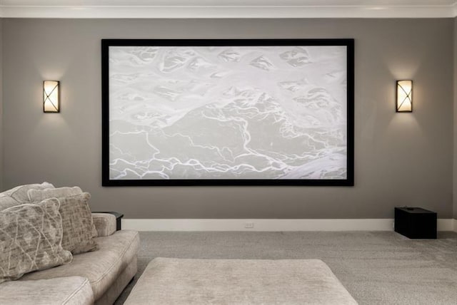 home theater with crown molding, carpet flooring, and baseboards