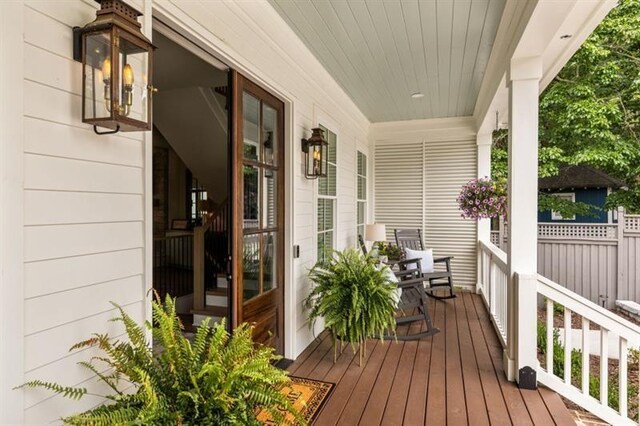 wooden terrace with covered porch