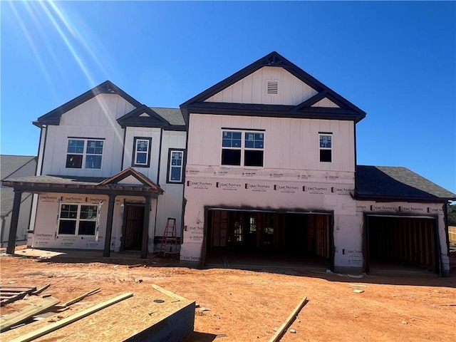 view of front of house featuring board and batten siding and a garage