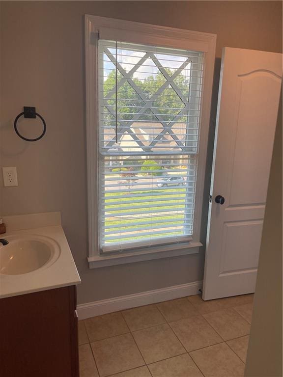 103 Mill Park Chase, Woodstock, GA 30188 - bathroom with tile patterned floors and vanity