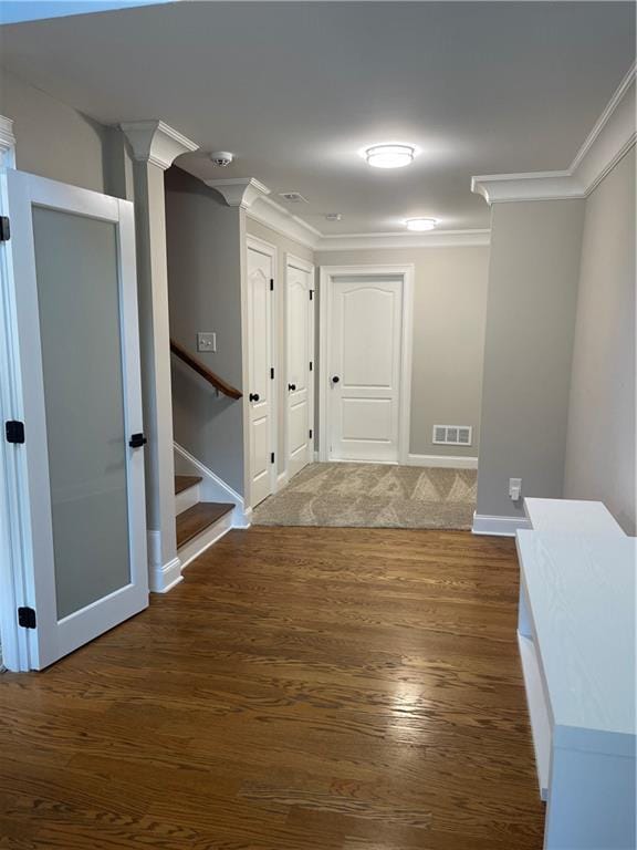 103 Mill Park Chase, Woodstock, GA 30188 - hall with wood finished floors, ornamental molding, and stairs