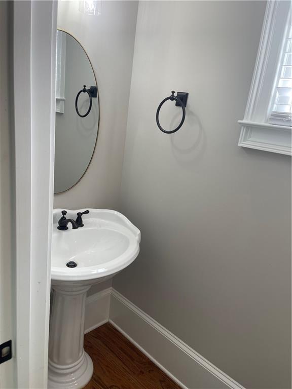 103 Mill Park Chase, Woodstock, GA 30188 - bathroom with wood finished floors and baseboards
