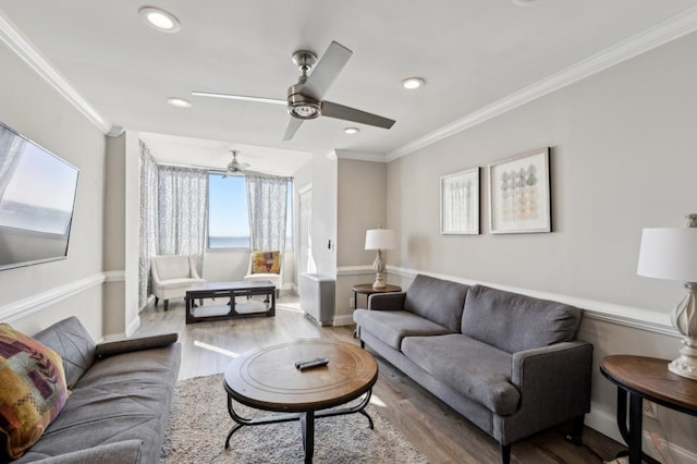 215 Piedmont Ave NE Unit 2103, Atlanta, GA 30308 - living room featuring crown molding, baseboards, ceiling fan, and wood finished floors