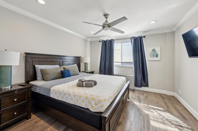 215 Piedmont Ave NE Unit 2103, Atlanta, GA 30308 - bedroom with recessed lighting, crown molding, baseboards, and light wood-type flooring