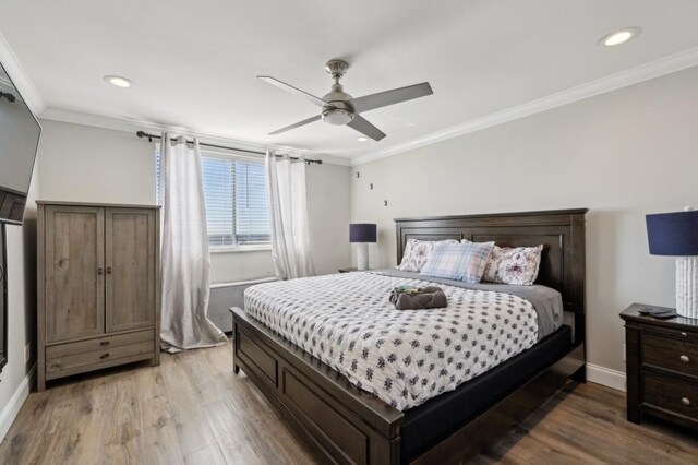 215 Piedmont Ave NE Unit 2103, Atlanta, GA 30308 - bedroom with baseboards, ornamental molding, recessed lighting, and light wood-type flooring