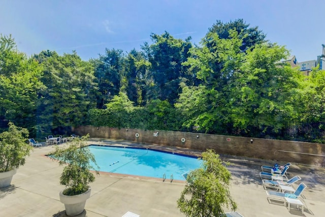 215 Piedmont Ave NE Unit 2103, Atlanta, GA 30308 - pool with fence and a patio area