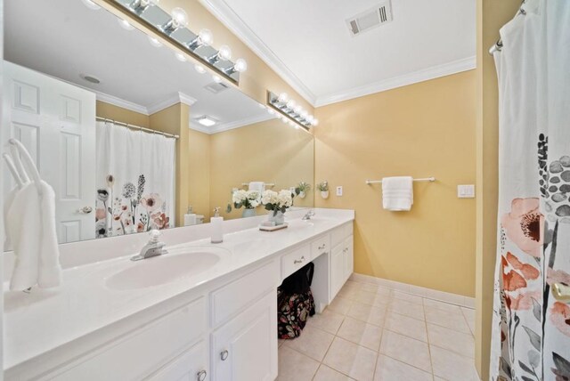 bathroom featuring crown molding, a shower with shower curtain, tile patterned floors, and vanity