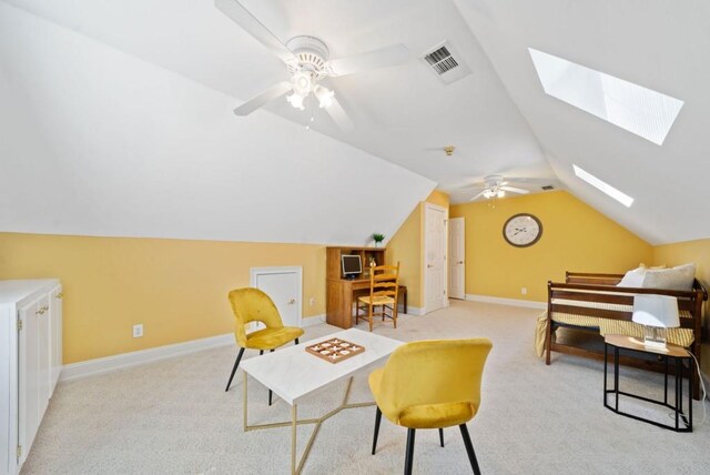 bedroom with ornamental molding, light carpet, and ceiling fan