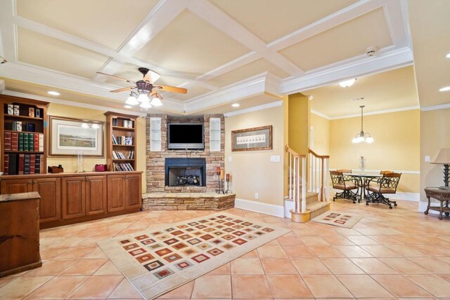 carpeted bedroom with ceiling fan and vaulted ceiling with skylight