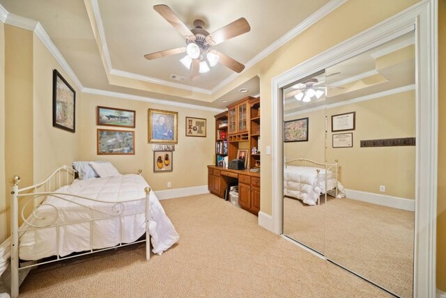 rec room featuring crown molding, ceiling fan, coffered ceiling, and light hardwood / wood-style floors