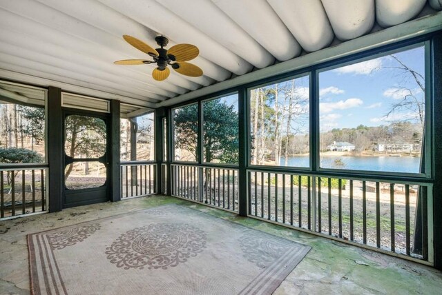 back of property featuring a patio, a deck, and a lawn