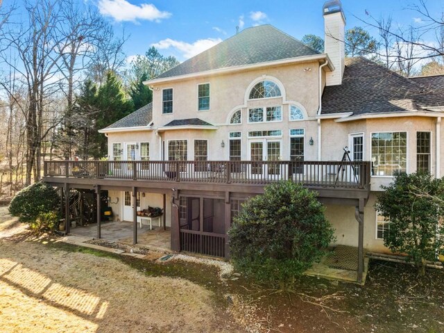 entrance to property with a patio area