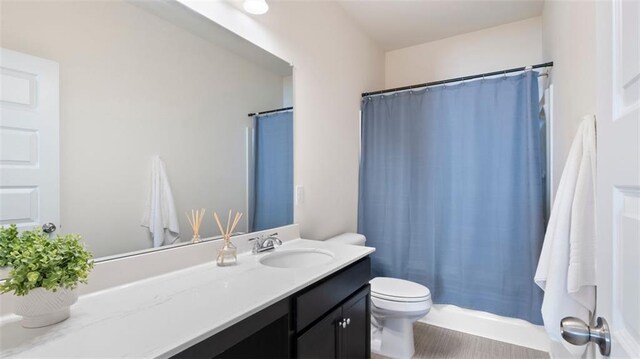 231 Malbone St SW, Cartersville, GA 30120 - full bath with vanity, toilet, and a shower with curtain