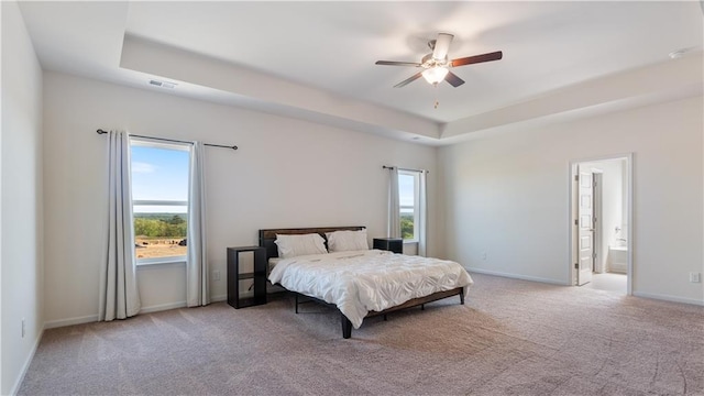 231 Malbone St SW, Cartersville, GA 30120 - bedroom with a tray ceiling, carpet floors, baseboards, and ensuite bathroom