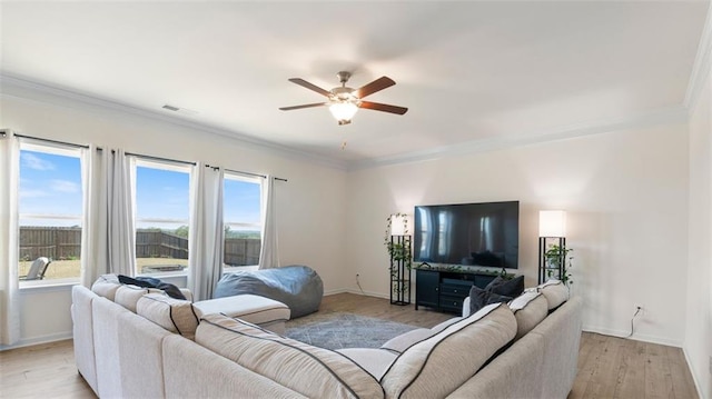231 Malbone St SW, Cartersville, GA 30120 - living area featuring crown molding, a ceiling fan, plenty of natural light, and baseboards